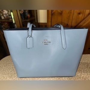Blue Coach tote purse.